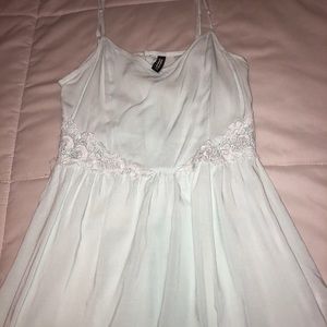 light teal dress with lace detail